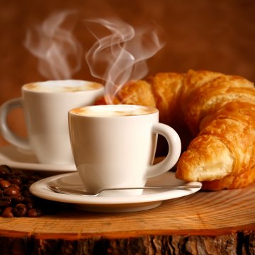 coffee makers braun brewsense kf7170 kf 7370 2 white cups of coffee and croissant